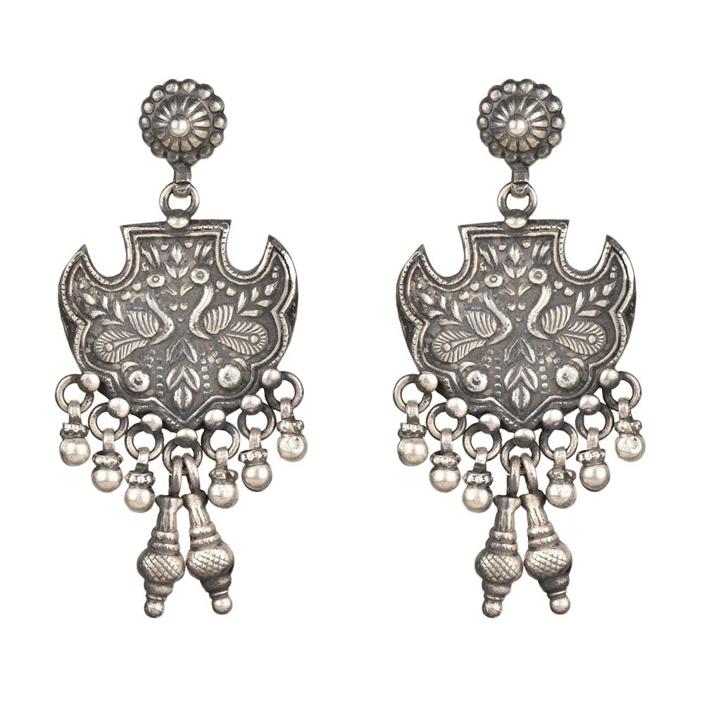 Side profile of handcrafted peacock earrings