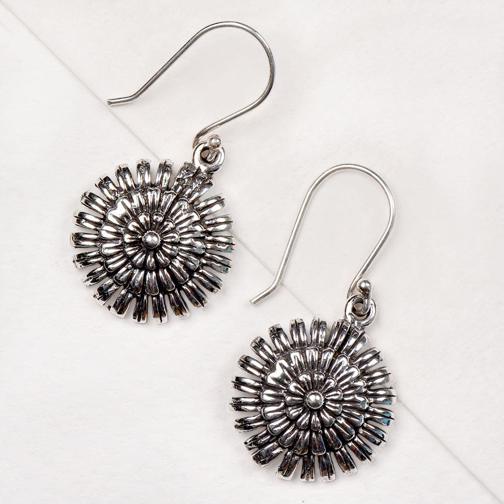 Detail of polished finish and Floral accent in 92.5 Sterling Silver