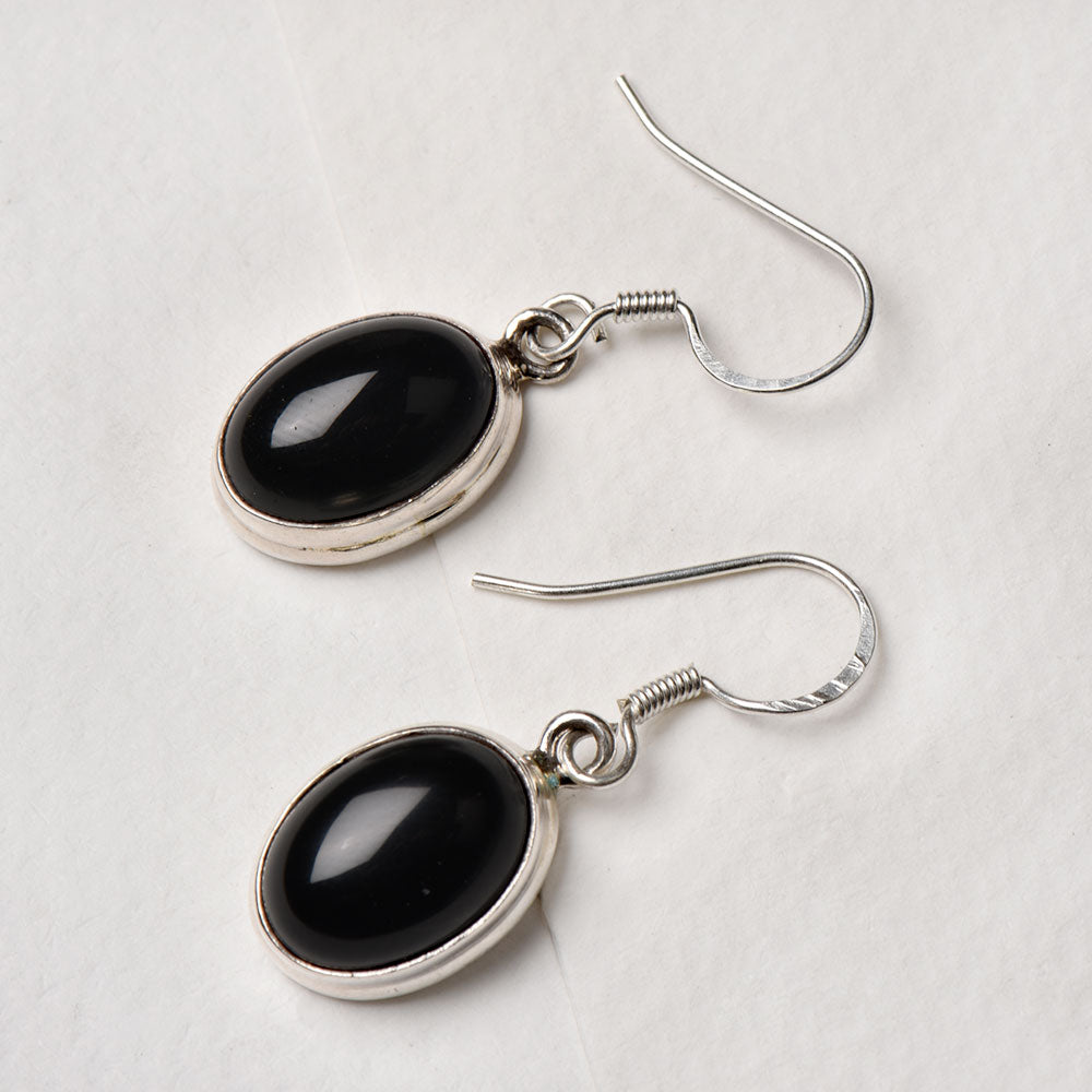 Detail of Black Onyx Oval Drop Earrings showing the artisanal workmanship and 92.5 Sterling Silver sheen