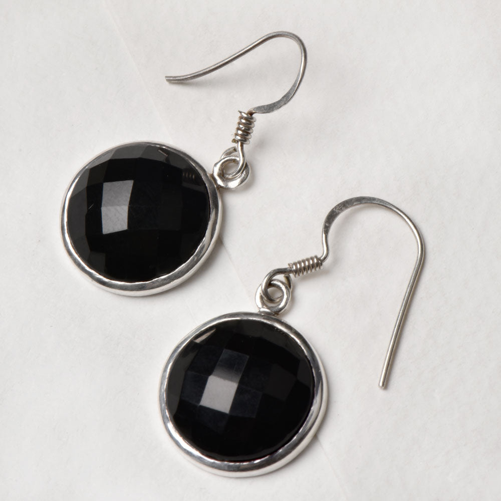 The Onyx Round Drop Earrings displayed with its subtle quiet design and Onyx stone