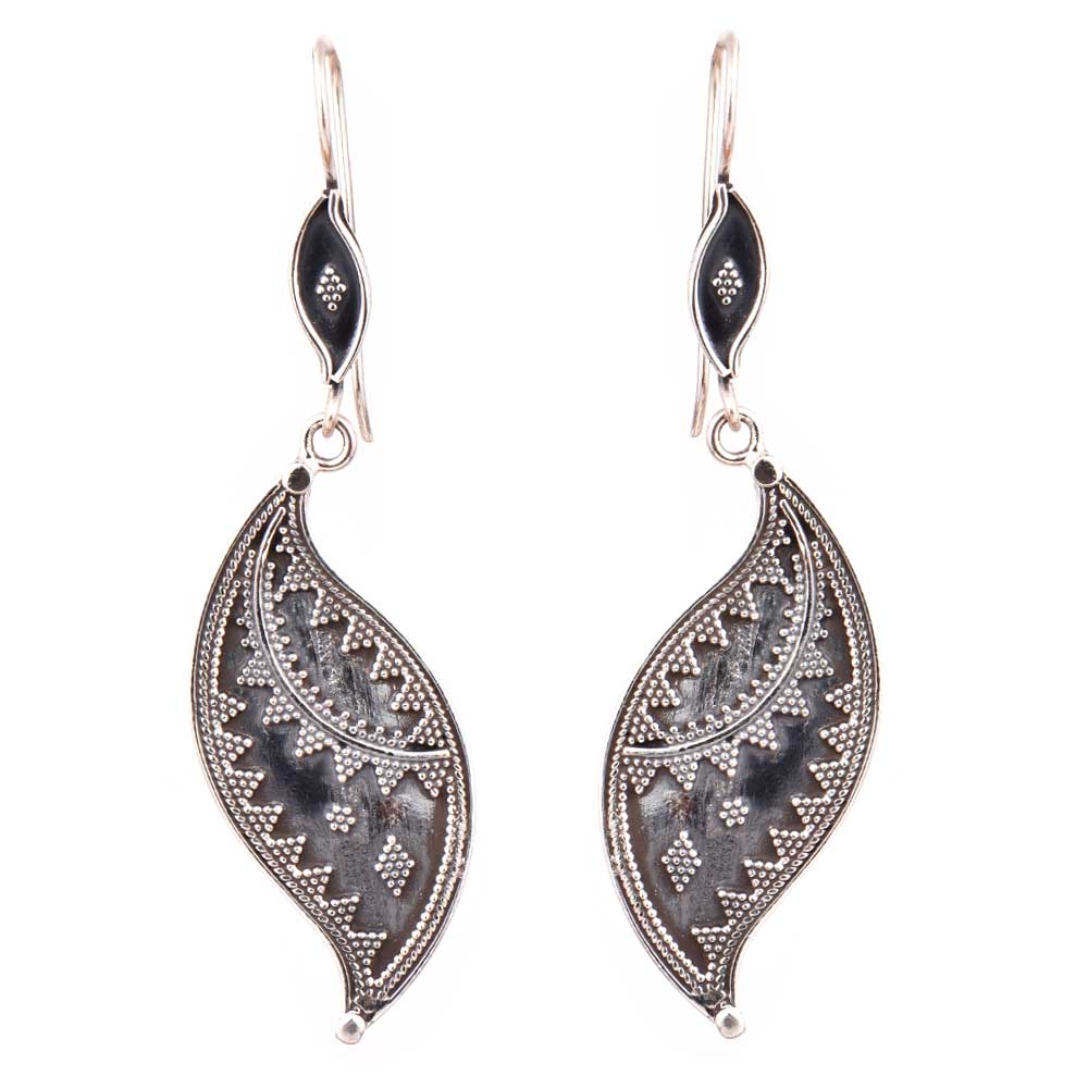 Angle view of Vanika earrings capturing the shine of 92.5 Sterling Silver