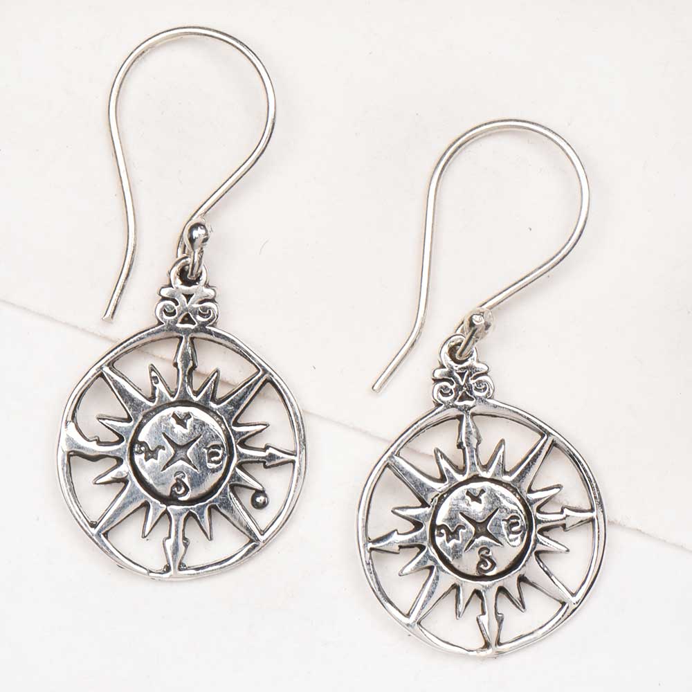 Handmade surya earrings showcasing traditional craft