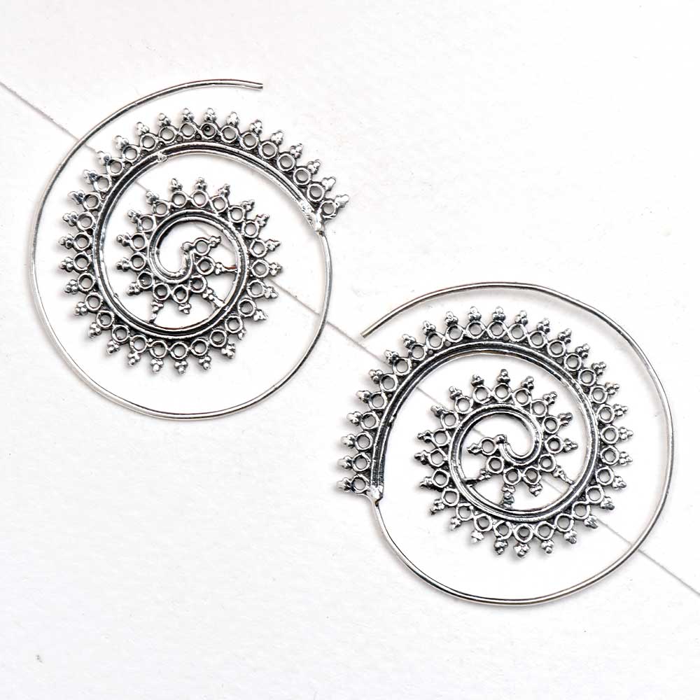 Close-up view of 92.5 sterling silver leaf drop earrings design