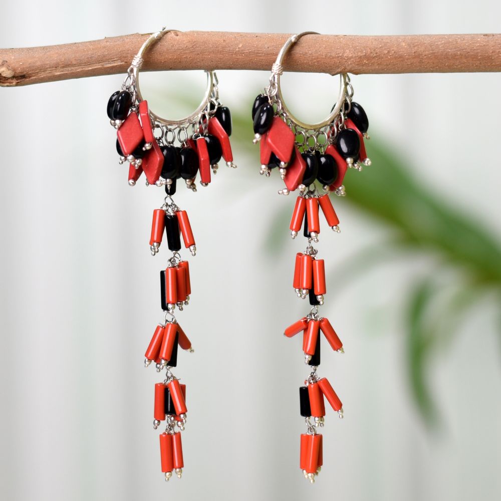 Pair of Red Black Beaded Hoop Earrings on a display stand, crafted from 92.5 Sterling Silver.