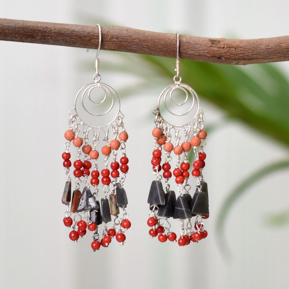 Pair of Orange Tassels Beaded Earrings on a display stand, crafted from 92.5 Sterling Silver.