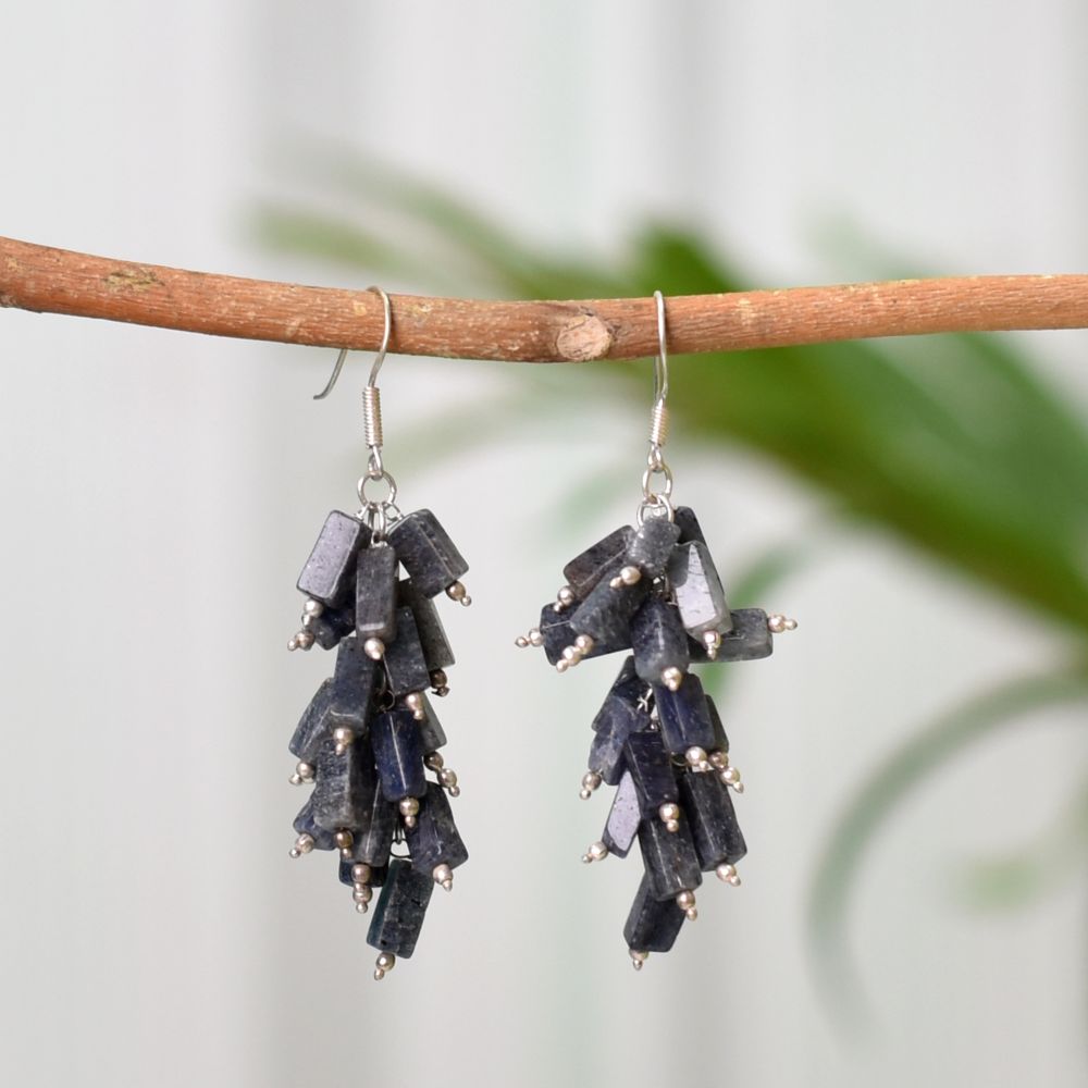 Close-up of intricate details on these 92.5 Sterling Silver dark purplea bead earrings.