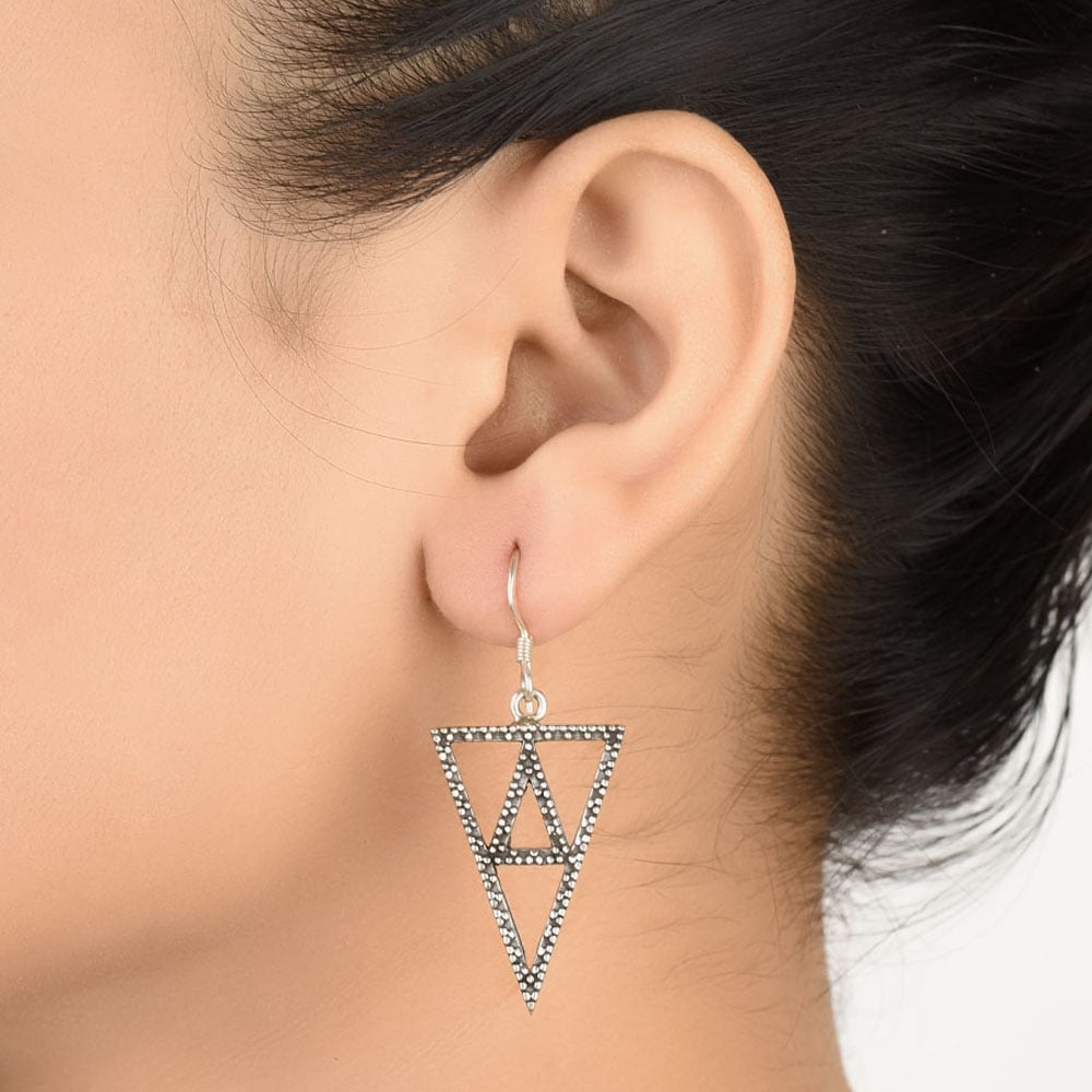 Close-up of the intricate design on Triangle Earrings with Silver accents in 92.5 Sterling Silver.