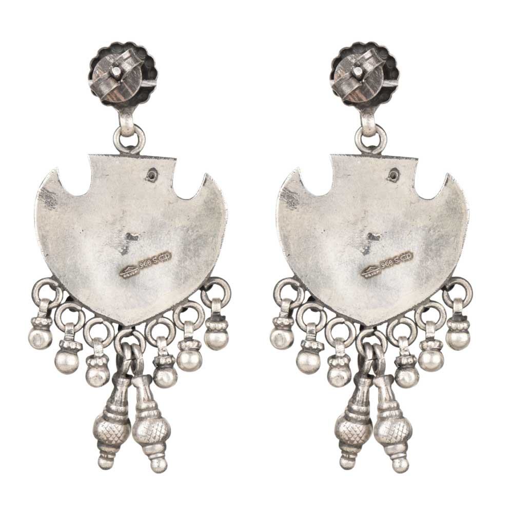 Close up of handmade peacock earrings in 92.5 Sterling Silver