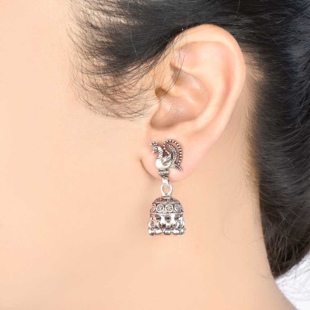 Side view of Peacock Jhumki Earrings, showing peacock design in 92.5 Sterling Silver