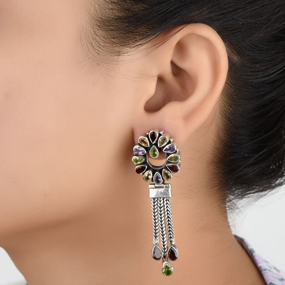 Front view of Reet tassel drop colored drop earrings crafted in 92.5 Sterling Silver.