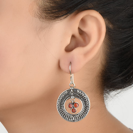 Front view of Reet jasper engraved circle earrings crafted in 92.5 Sterling Silver.