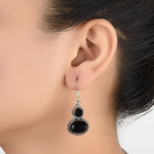 Front view of Noir Onyx onyx dangle earrings crafted in 92.5 Sterling Silver.