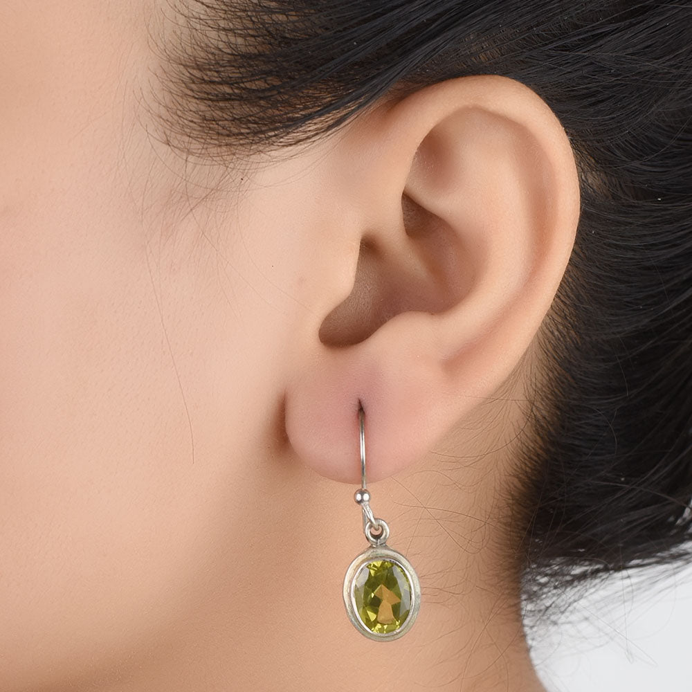 Front view of Neel Topaz topaz dangle earrings crafted in 92.5 Sterling Silver.