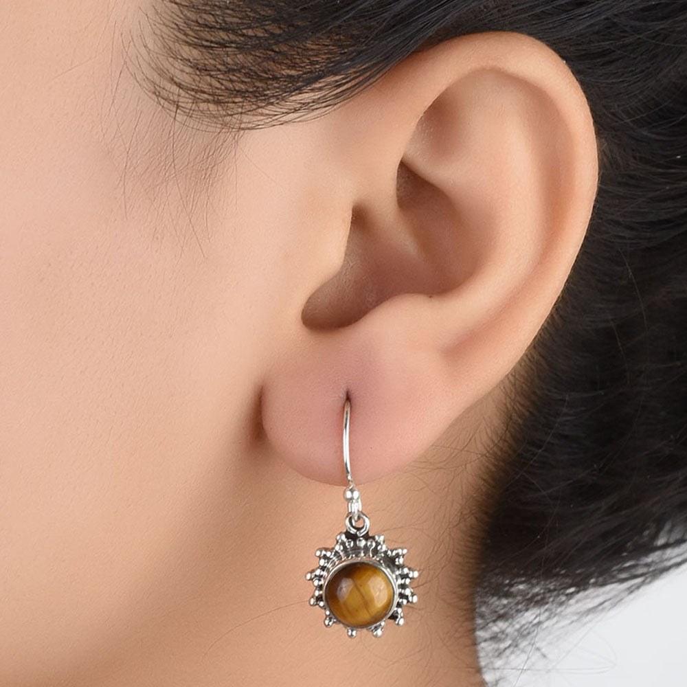 Front view of Reet round earrings crafted in 92.5 Sterling Silver.