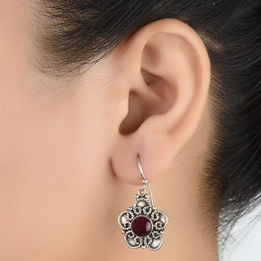 Front view of Gul Jade jade floral dangle earrings crafted in 92.5 Sterling Silver.