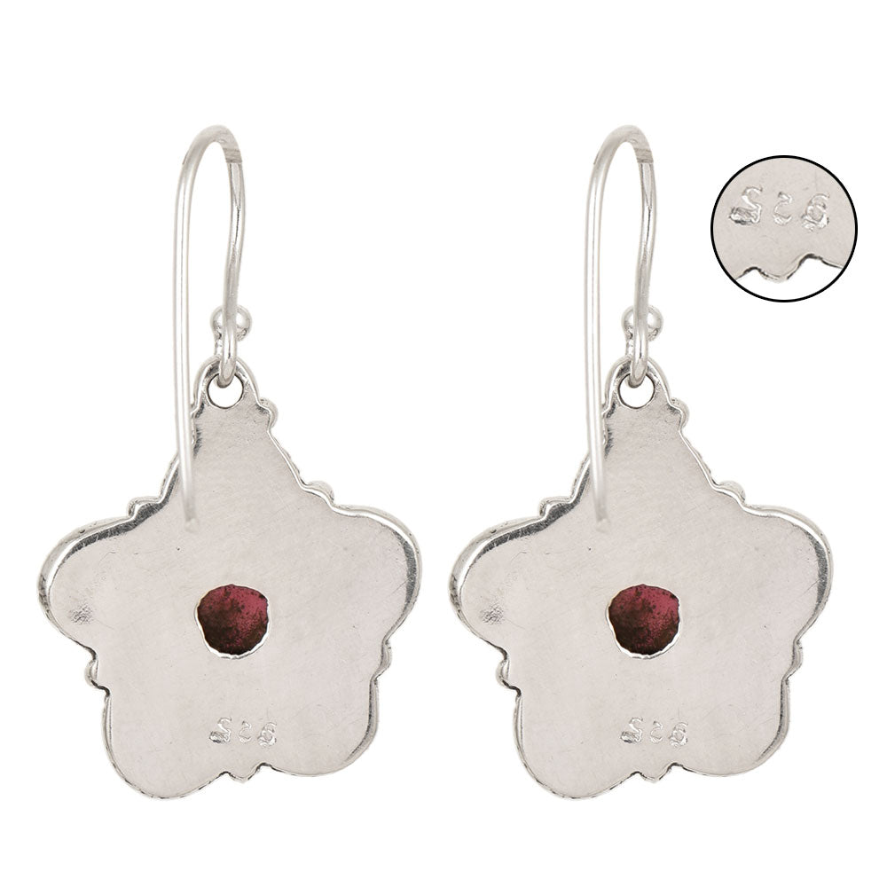 Close-up of intricate details on these 92.5 Sterling Silver jade floral dangle earrings.