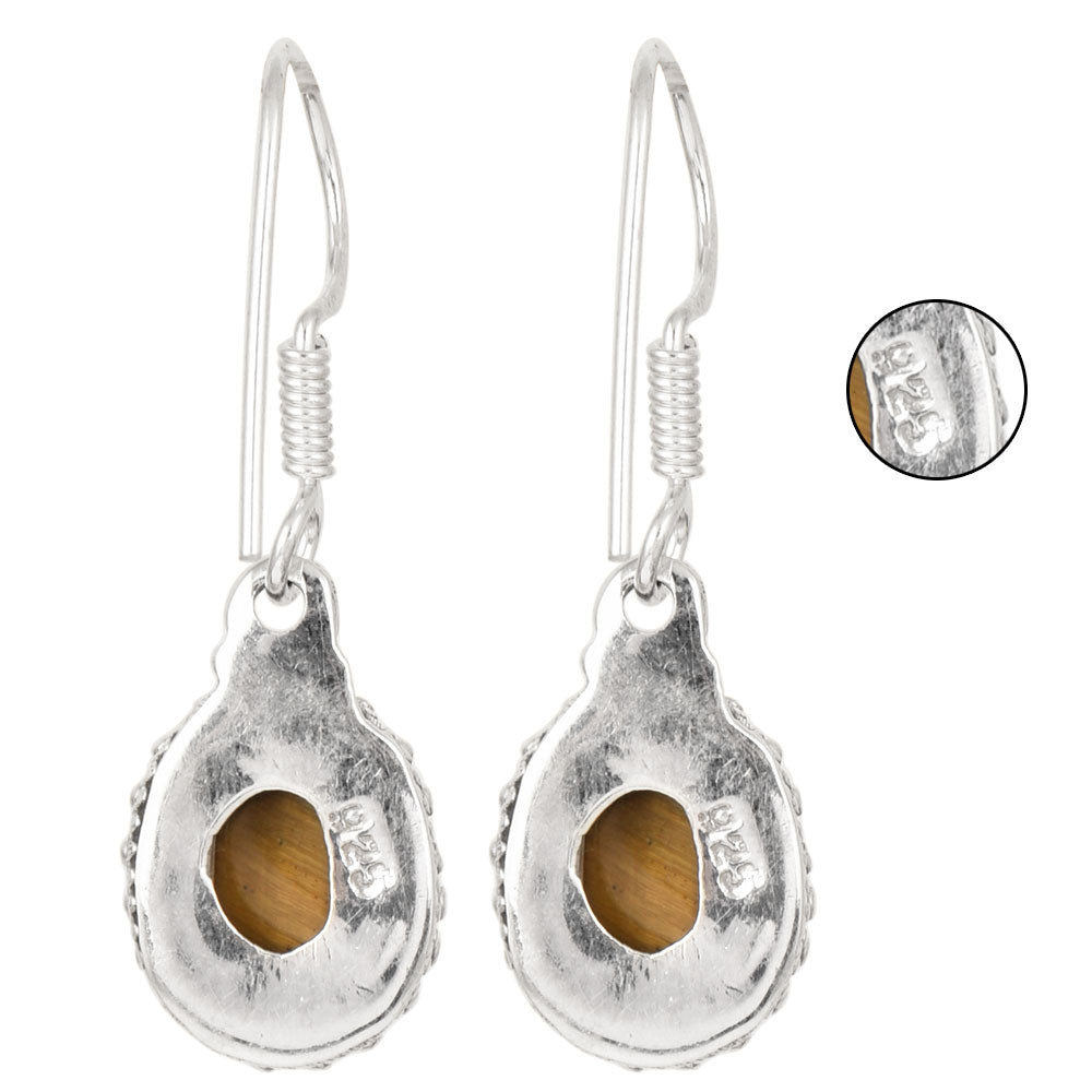 Close-up of intricate details on these 92.5 Sterling Silver oval drop earrings.