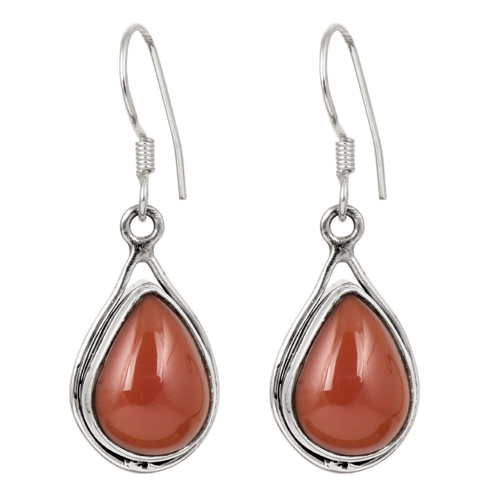 Side angle showing red jasper raindrop stud earrings with red , silver tones.