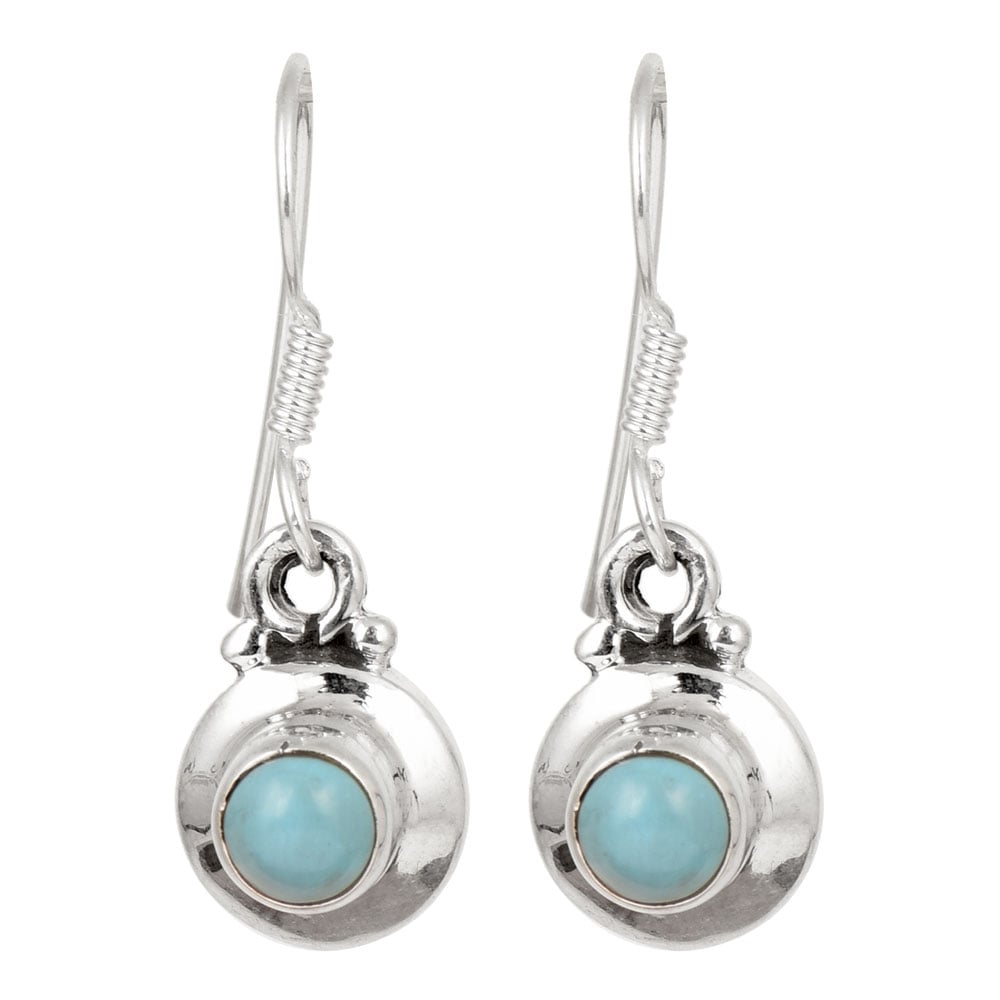 Side angle showing turquoise stud earrings with silver , turquoise tones.