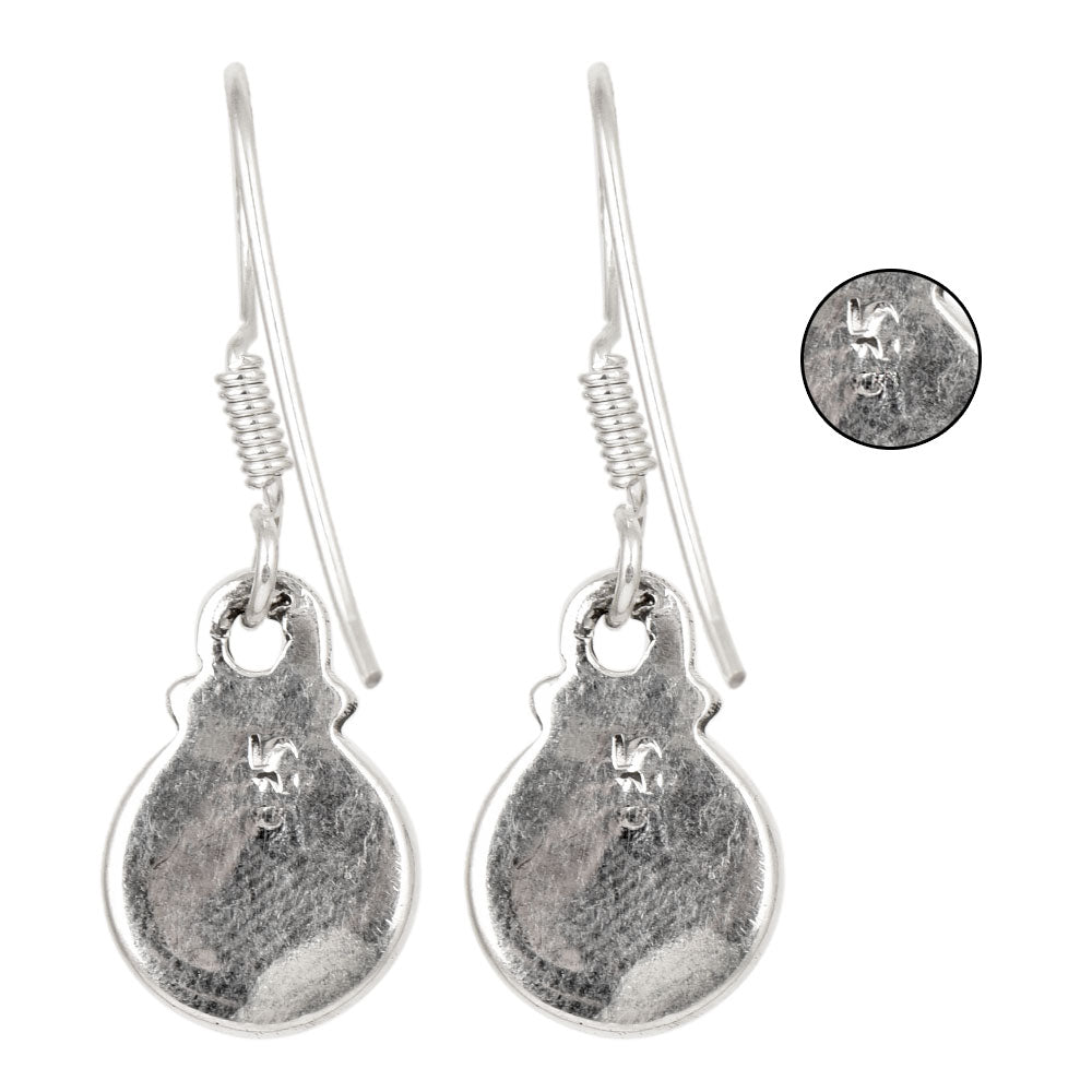 Close-up of intricate details on these 92.5 Sterling Silver turquoise stud earrings.