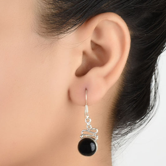 Front view of Noir Onyx black onyx round earrings crafted in 92.5 Sterling Silver.
