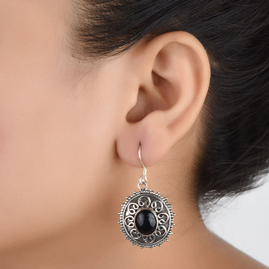 Front view of Noir Onyx onyx round dangle earrings crafted in 92.5 Sterling Silver.
