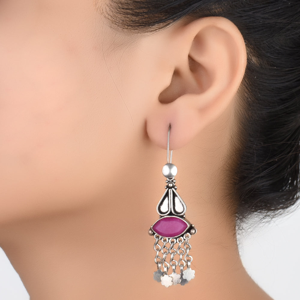 Pair of Pink Tourmaline Dangle Earrings displayed on a neutral background for a clear view.