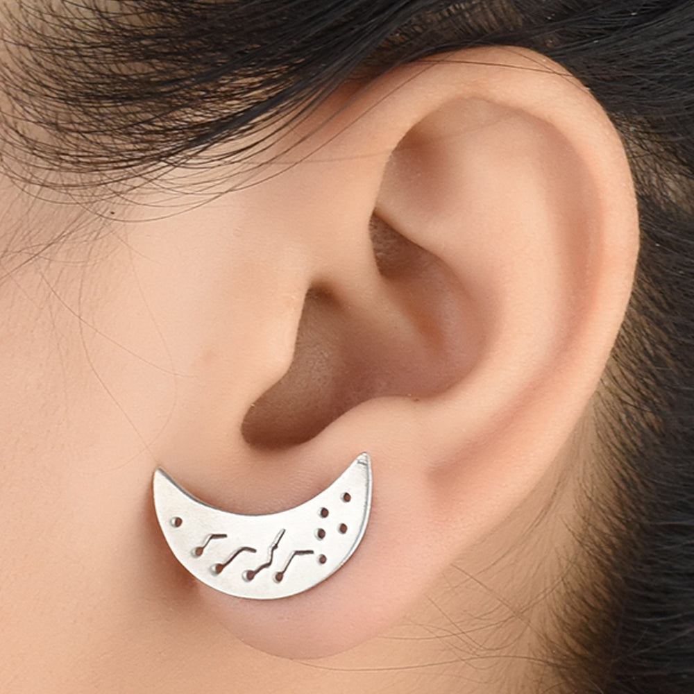 Pair of Moon Stud Earrings displayed on a neutral background for a clear view.