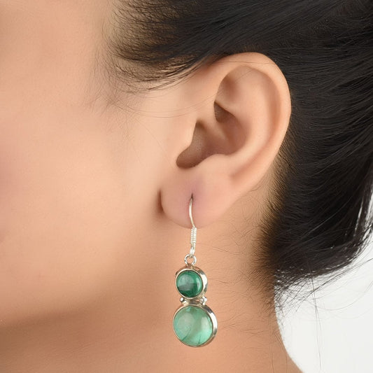 Close-up of the intricate design on Round Dangle Earrings with Silver accents in 92.5 Sterling Silver.