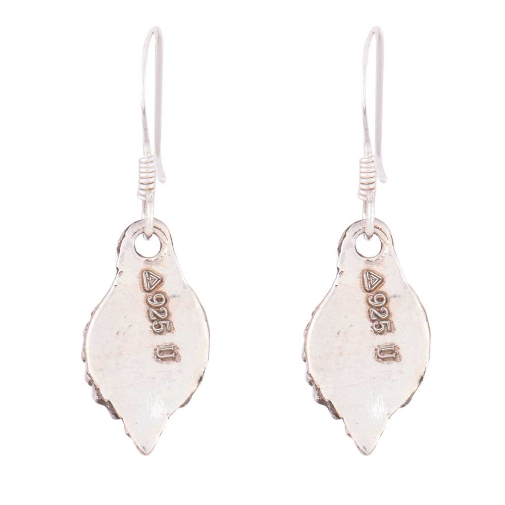 Close-up of coral set in 92.5 Sterling Silver earrings.