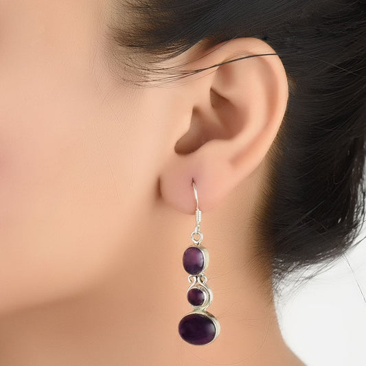 Dangle earrings with amethyst in 92.5 Sterling Silver, expertly crafted and inspired by ancestral markings.