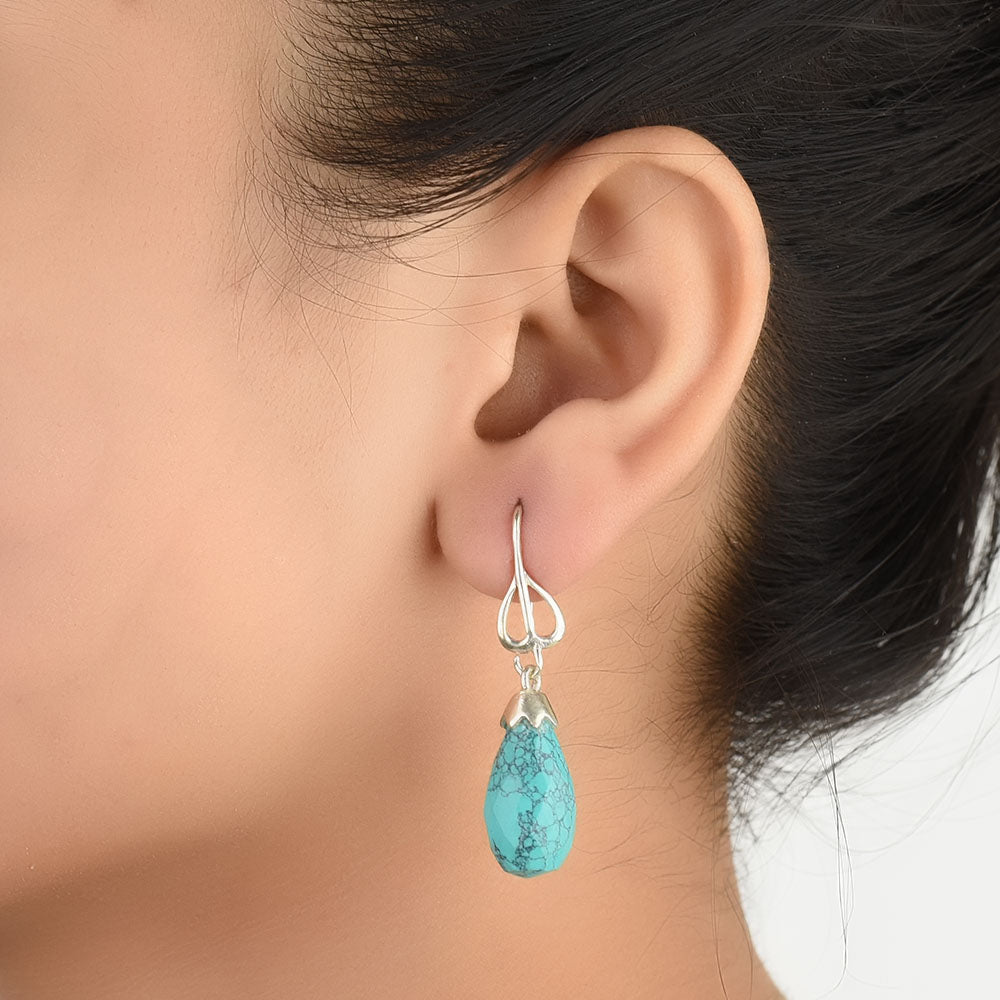 Close-up of the intricate design on Turquoise Dangle Earrings with Silver and Turquoise accents in 92.5 Sterling Silver.