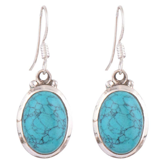 Close-up of the intricate design on Turquoise Teardrop Earrings with Silver and Turquoise accents in 92.5 Sterling Silver.