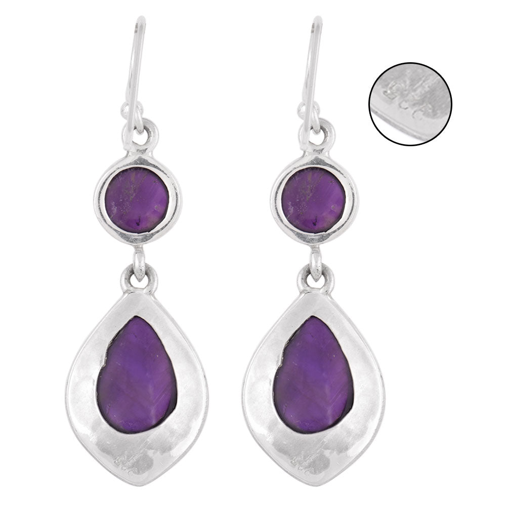 Close-up of amethyst set in 92.5 Sterling Silver drop earrings.