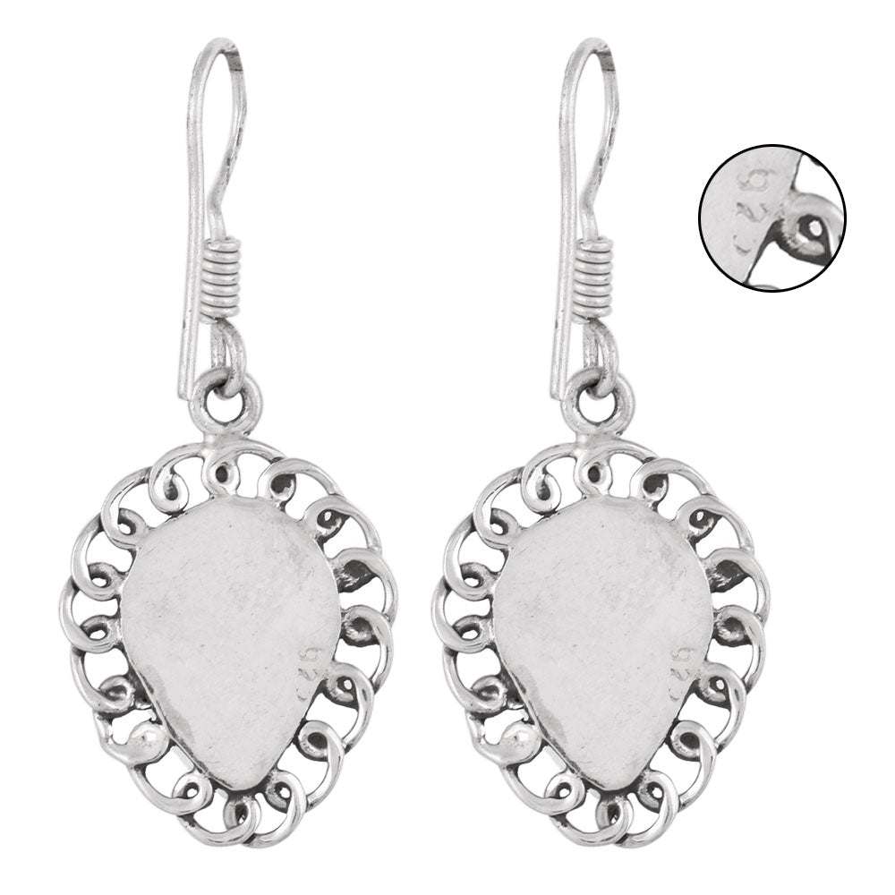 Close-up of black sun stone set in 92.5 Sterling Silver drop earrings.