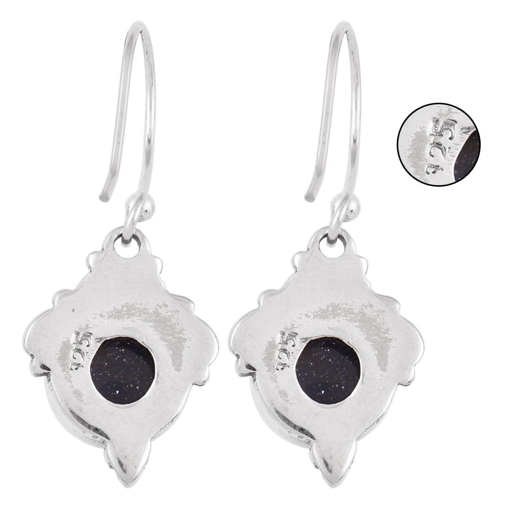 Close-up of blue goldstone set in 92.5 Sterling Silver wire earrings.