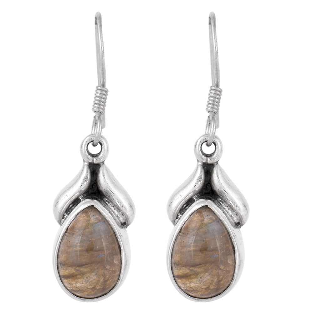 Reet drop earrings resting on fabric, showing tear jasper and subtle handwork.
