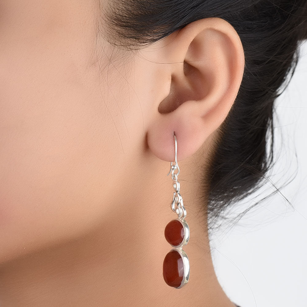 Earrings with jade in 92.5 Sterling Silver, handcrafted and inspired by godna tattoos.