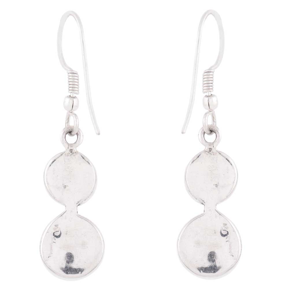 Close-up of pearl set in 92.5 Sterling Silver dangle earrings.