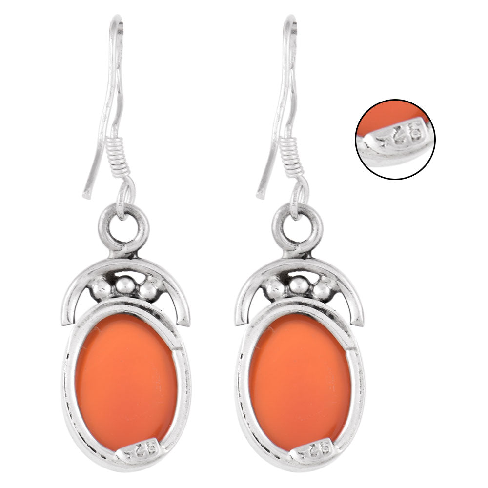Close up of handmade carnelian earrings in 92.5 Sterling Silver