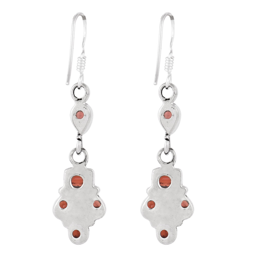 Close up of handmade garnet earrings in 92.5 Sterling Silver
