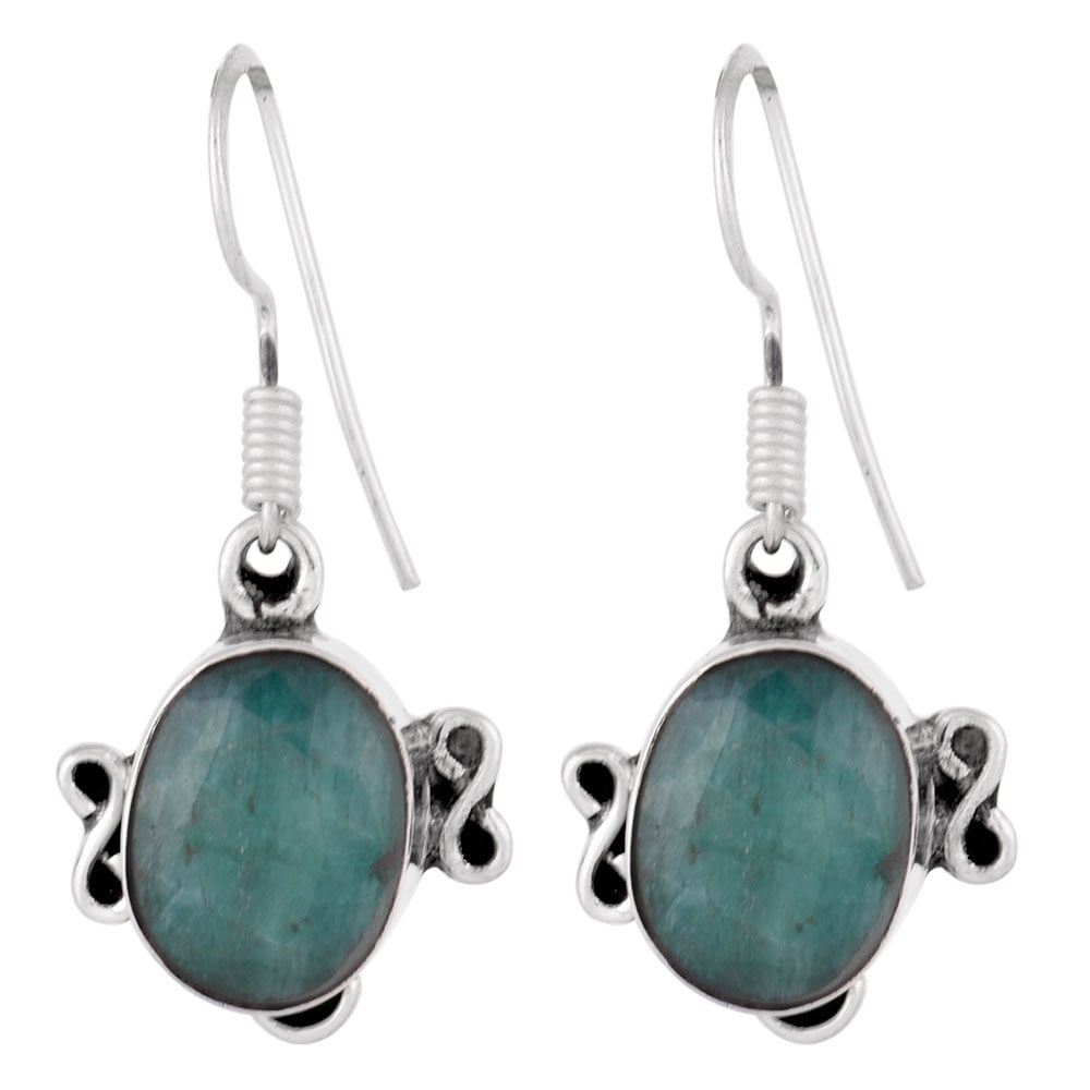 Detail of jade earrings showing stone and silver