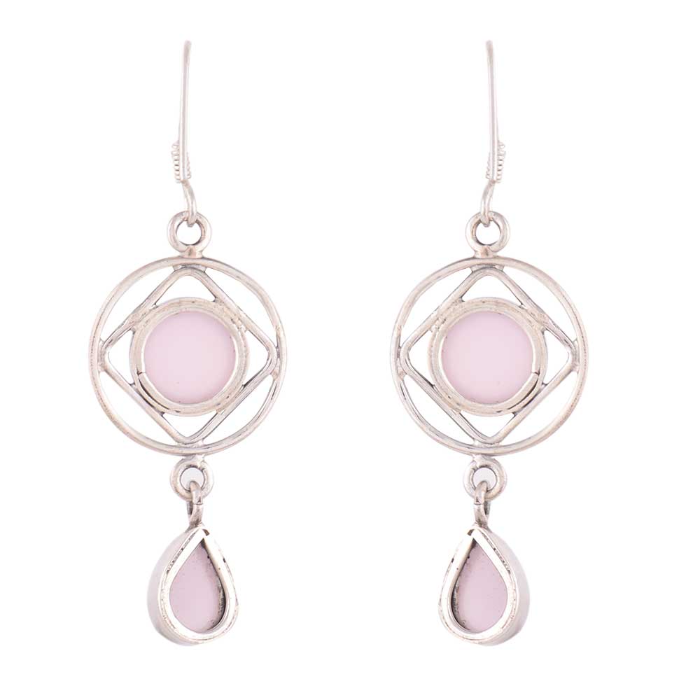 Close up of Rose Quartz stone set in sterling silver earrings