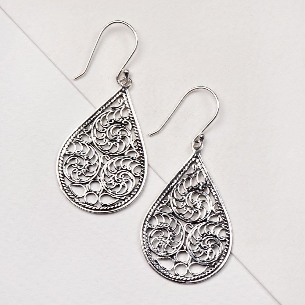 Side view of Teardrop Drop Earrings, showing oval design in 92.5 Sterling Silver