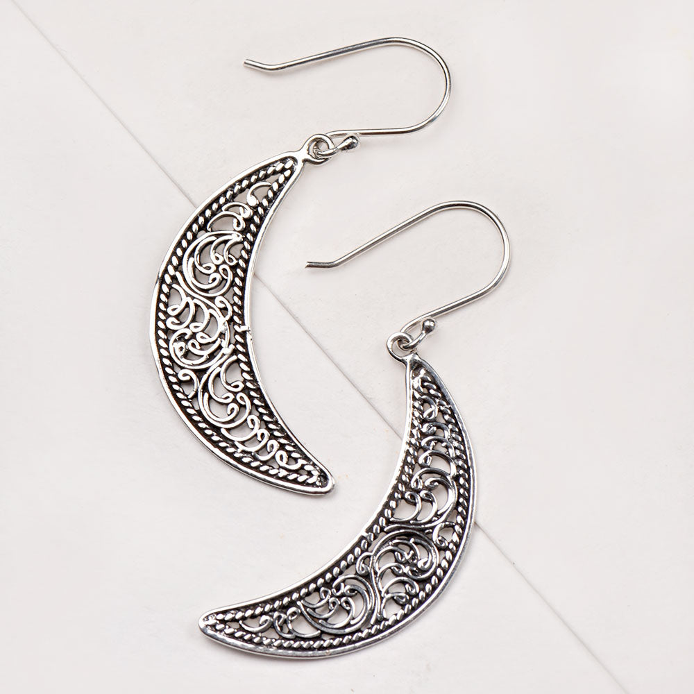 Side view of Moon Dangle Earrings, showing dangle design in 92.5 Sterling Silver
