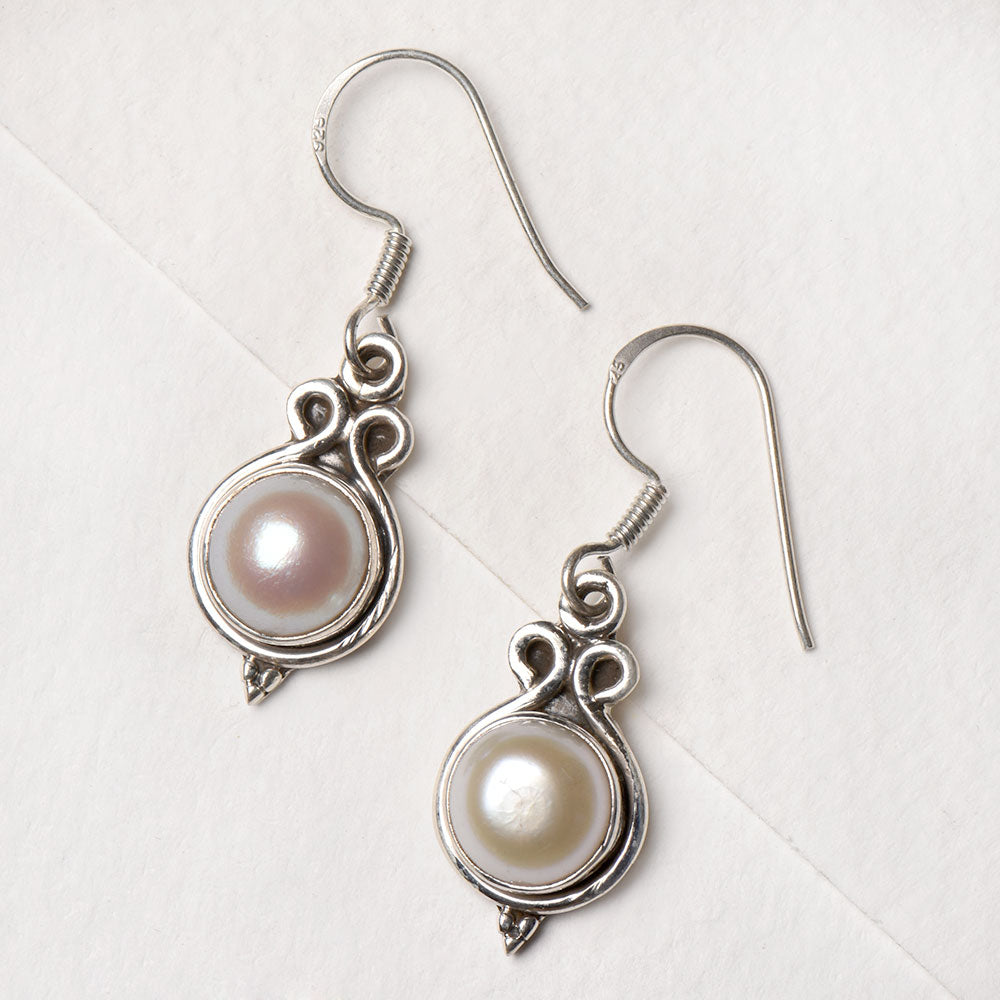 Closeup of Moonstone Moon Earrings showcasing the detailed earrings motif and 92.5 Sterling Silver finish