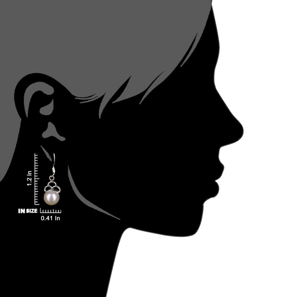 Side view of the artisan made Quartz Round Dangle Earrings revealing the texture and light play