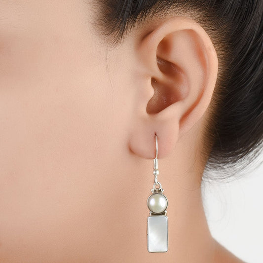 Moonstone Moon Dangle Earrings handcrafted in 92.5 Sterling Silver with subtle Moonstone Moon details capturing quiet heritage