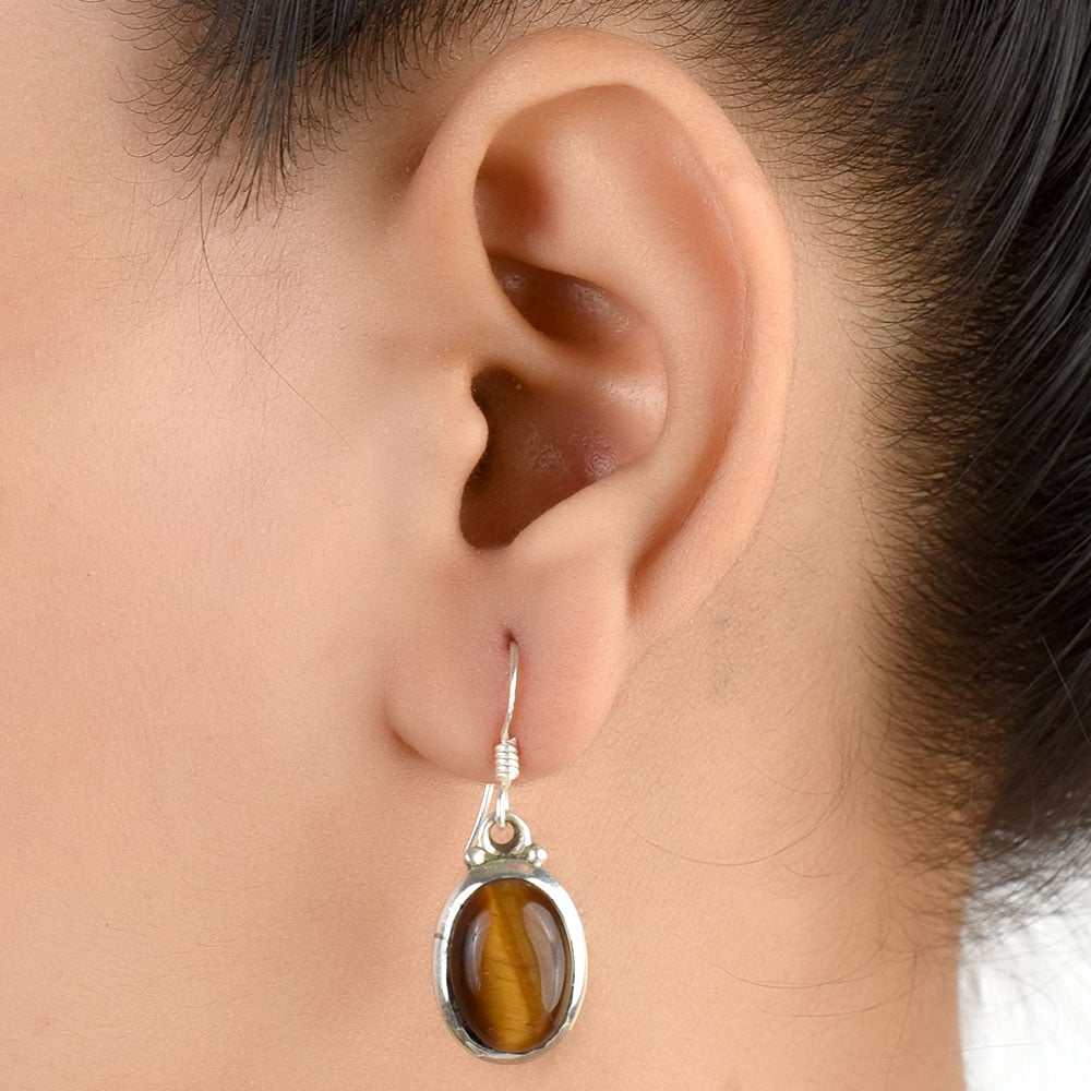 Oval Earrings handcrafted in 92.5 Sterling Silver with subtle gemstone details capturing quiet heritage