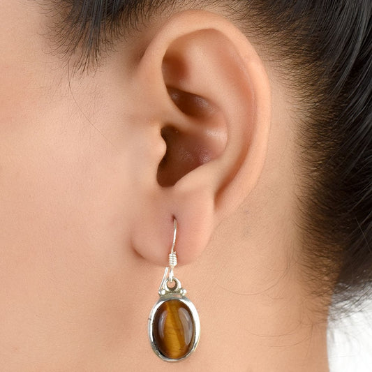 Oval Earrings handcrafted in 92.5 Sterling Silver with subtle gemstone details capturing quiet heritage